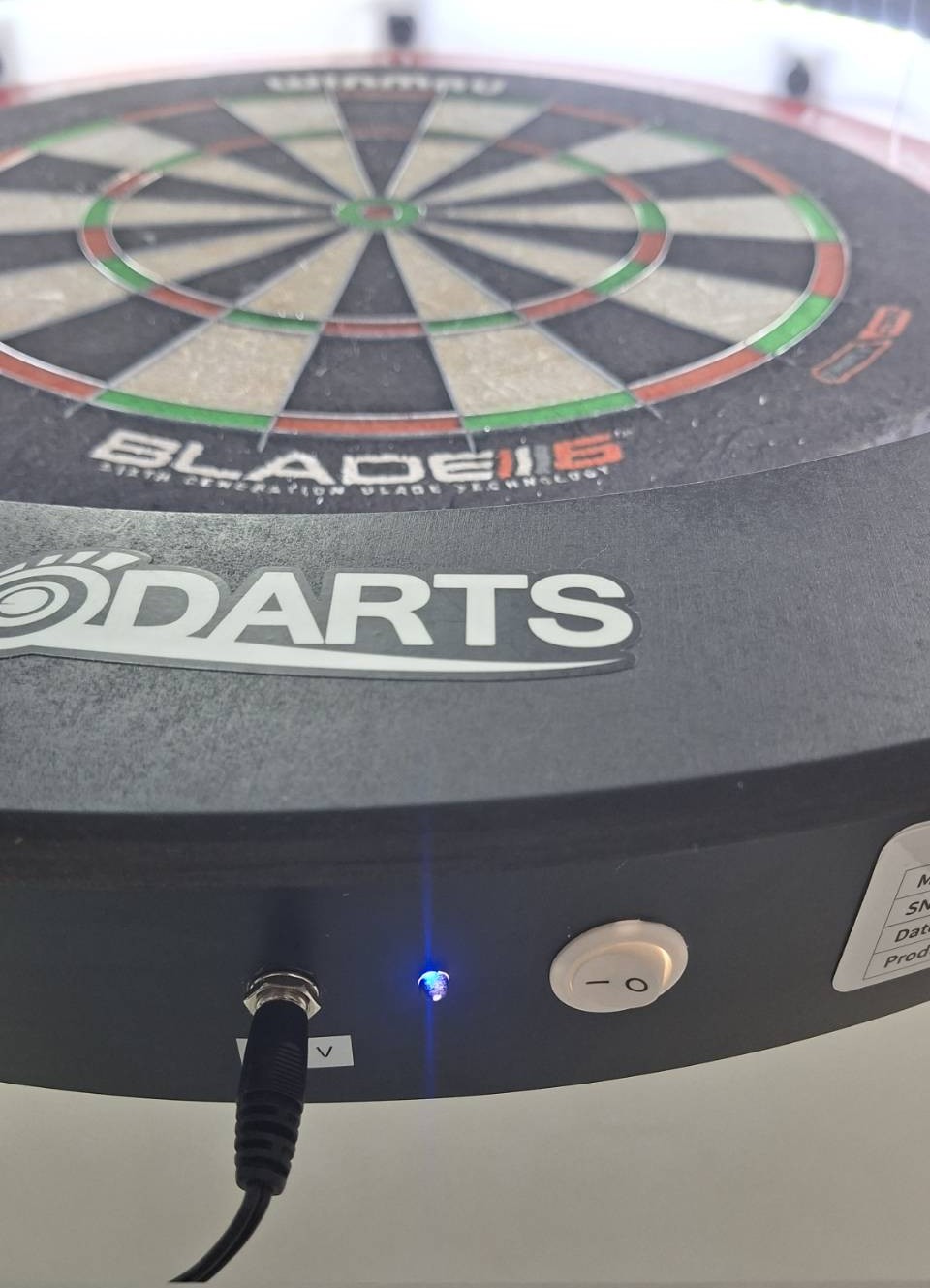 Reference screen for: Turn on the dart machine and wait for the blue light